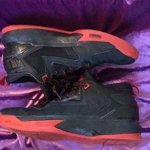 Adidas dame 2 black and red colorway.